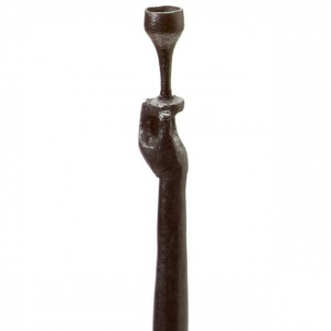 This carving shows a goblet being held by a hand, all carved from one pencil's graphite
