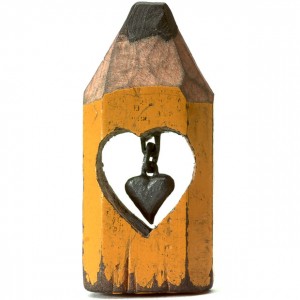 Dalton hollowed out the centre of the wood, then carved the central column of graphite to create this hanging, linked heart